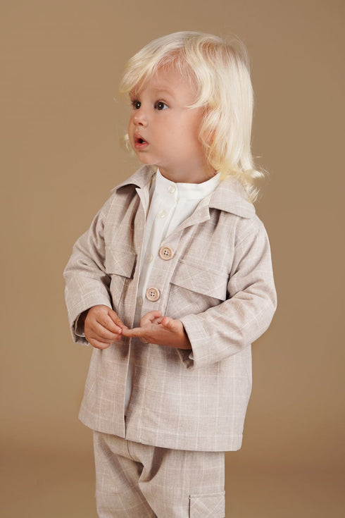 CHAQUETA CUADROS BEIGE CUELLO REDONDO Y BOLSILLOS